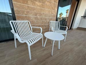 J&G Suites的阳台或露台