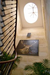 a painting of a deer on the floor of a building at Charmant Appartement Avec Terrasse in Bordeaux