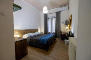 Postel nebo postele na pokoji v ubytování B&B Domus Enna