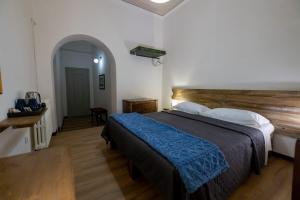 Postel nebo postele na pokoji v ubytování B&B Domus Enna