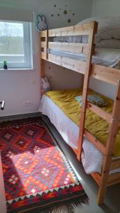 Postel nebo postele na pokoji v ubytování Les Adrets de Malmedy