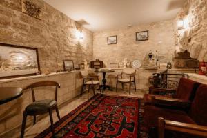 Posezení v ubytování Qala Hotel
