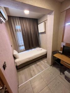 Postel nebo postele na pokoji v ubytování Okur Otel