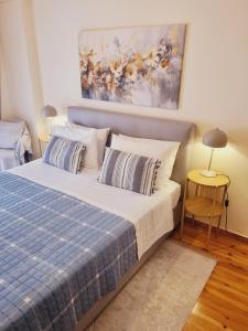 Postel nebo postele na pokoji v ubytování City Life Apartment