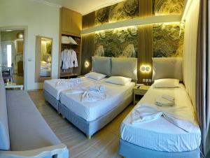 Postel nebo postele na pokoji v ubytování Galazio Asteri 1 Green, Luxury & Eco