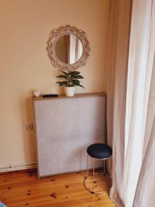 Posezení v ubytování City Life Apartment + 17 fotografií