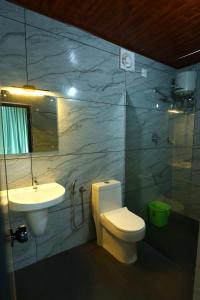 Ένα μπάνιο στο Wayanad Cave N Pillar Resort