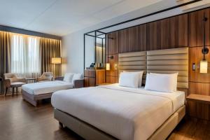 Postel nebo postele na pokoji v ubytování AC Hotel by Marriott Stockholm Ulriksdal