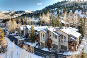 an aerial view of a home in the snow at KBM Resorts Upgraded Easy walk to Main St Close to Deer Valley hot tub gas fireplace BCC-1101 in Park City