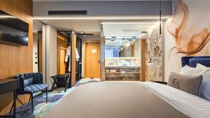 Postel nebo postele na pokoji v ubytování Hotel Bucura