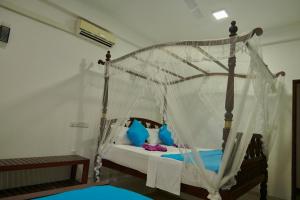 Letto o letti in una camera di Azure Resort Mirissa