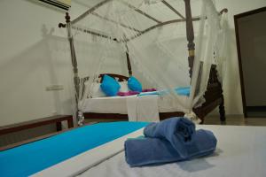 Letto o letti in una camera di Azure Resort Mirissa