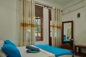 Letto o letti in una camera di Azure Resort Mirissa