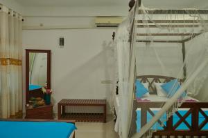 Letto o letti in una camera di Azure Resort Mirissa