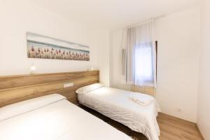 Letto o letti in una camera di La Solana Apartaments & Spa