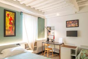 TV a/nebo společenská místnost v ubytování Duccio Nacci Rooms- Guesthouse
