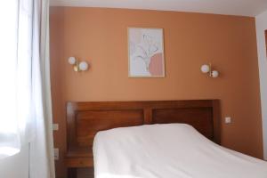 Postel nebo postele na pokoji v ubytování Hotel Etchoinia