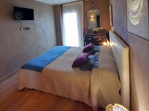 A bed or beds in a room at Dolci risvegli appartamento vista mare