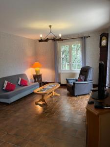 Гостиная зона в Maison de Charme Dordogne - Nature & Randonnées