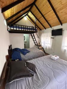 Postel nebo postele na pokoji v ubytování Hospedaje - Cabañas villa rosita