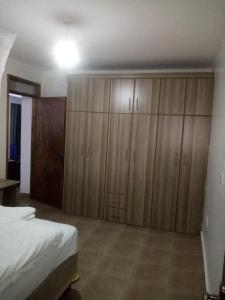 Ένα ή περισσότερα κρεβάτια σε δωμάτιο στο Jawamu Homes