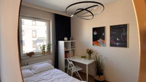 Postel nebo postele na pokoji v ubytování Apartament Podniebny - 4 sypialnie - Lake Apartments, osiedle Tuwima Park - Olsztyn