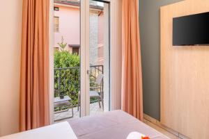 TV a/nebo společenská místnost v ubytování Hotel Taormina