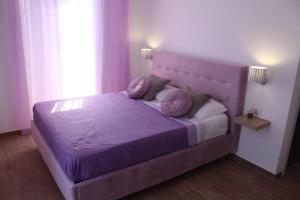 Postel nebo postele na pokoji v ubytování Antares Rooms