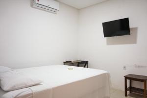 TV a/nebo společenská místnost v ubytování Hotel Galícia
