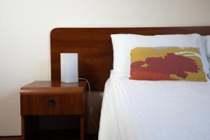 Postel nebo postele na pokoji v ubytování Amber House Swierkowa