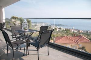Balkón nebo terasa v ubytování Whitehouse Apartments