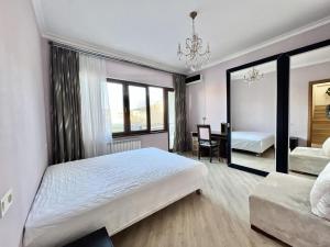Voodi või voodid majutusasutuse Villa in Tbilisi toas