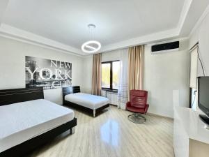 Voodi või voodid majutusasutuse Villa in Tbilisi toas