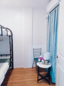 Ένα ή περισσότερα κρεβάτια σε δωμάτιο στο De Richness +4 φωτογραφίες