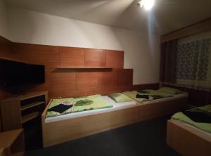 Hotel a ubytovna Zimní stadion Slaný客房内的一张或多张床位
