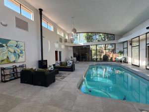 a house with a swimming pool in a living room at Bloem Spa Hotel & Conference in Bloemfontein