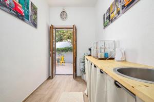 Cuisine ou kitchenette dans l'établissement Nott'e Die