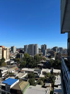 a city view of a city with buildings and trees at Depto 2 habitaciones y 2 baños in Concepción