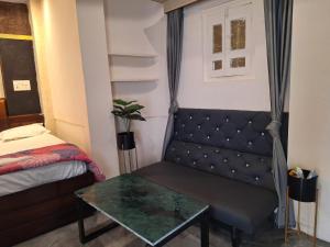 Postel nebo postele na pokoji v ubytování Mavenoak Dreams B&B