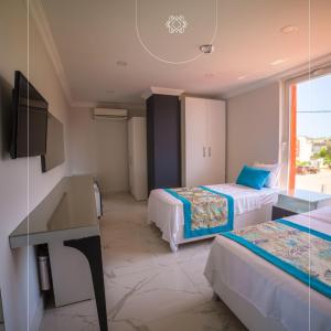 Ένα ή περισσότερα κρεβάτια σε δωμάτιο στο Homes Global