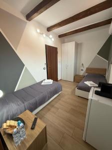 Postel nebo postele na pokoji v ubytování Sara's apartments