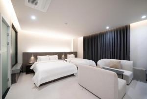Cheomdan Lantana Hotel客房内的一张或多张床位