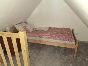 Postel nebo postele na pokoji v ubytování Chalupa U Křížku Říčky v Orlických horách