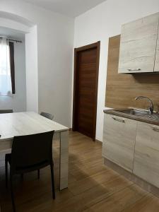 Kuchyň nebo kuchyňský kout v ubytování Sara's apartments