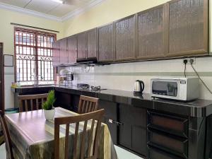 Galeriebild der Unterkunft Aisyah Homestay NEAR A FAMOSA TAMPIN in Kampong Pulau Sebang