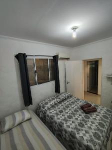 Postel nebo postele na pokoji v ubytování Casa Praia Barequeçaba