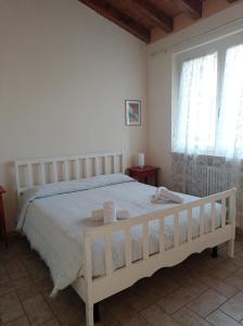 Posteľ alebo postele v izbe v ubytovaní Corte Valesana