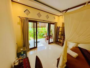 Buntera Homestay Sidemen客房内的一张或多张床位