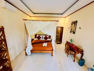 Buntera Homestay Sidemen客房内的一张或多张床位