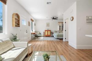 a living room with a couch and a table at The Little Oasis in Escondido